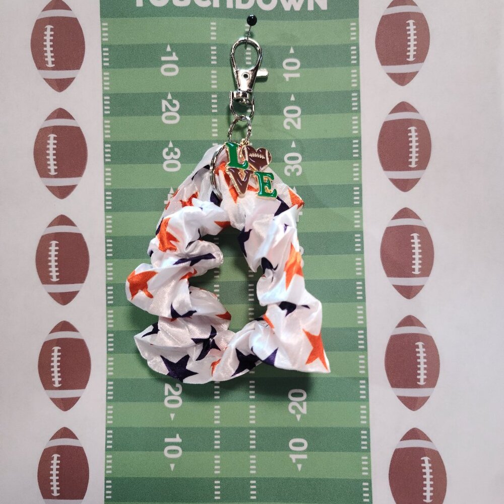 Football Themed Wristlet Keyring with a Football related charm attached !!